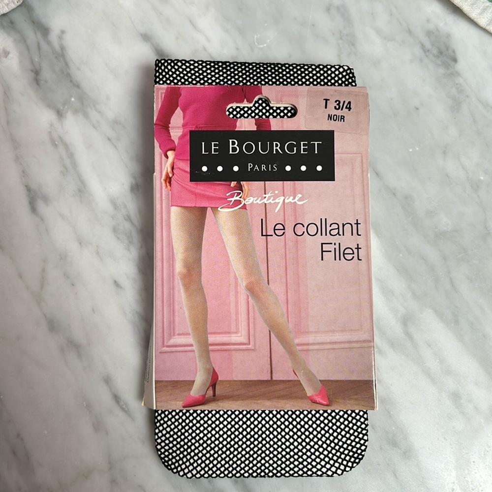 Black Fish Net tights from Paris, France. Brand new never used.